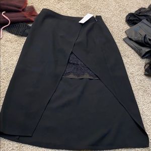 Black skirt with lace cut out in the front
